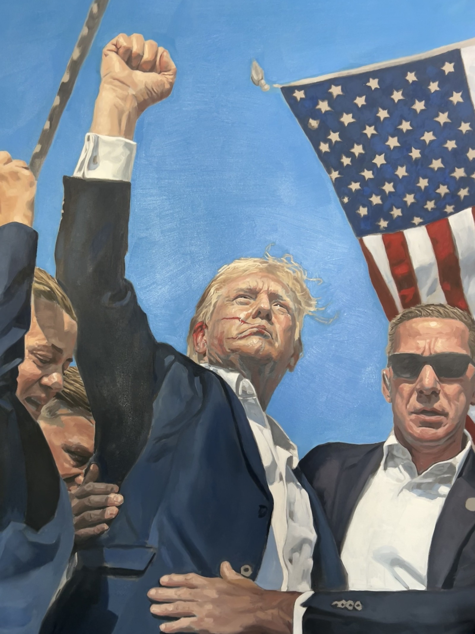 FIGHT!, oil on canvas: Donald Trump raising his fist beneath an American flag, flanked by Secret Service agents